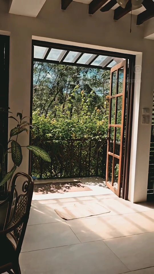 The lush natural landscape surrounding The Red Hen Homestead — tropical greenery and mountain foothills at Mt. Banoy, Batangas City